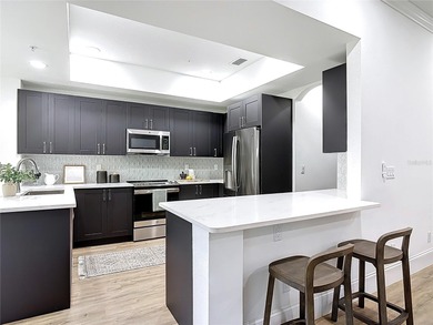 Experience elevated waterfront living in Grand Vista, the newest on Grand Haven Golf Club in Florida - for sale on GolfHomes.com, golf home, golf lot