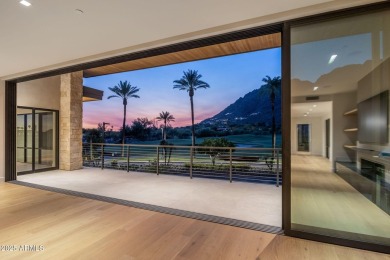 Experience the epitome of elegance and modern living in this on The Phoenician  in Arizona - for sale on GolfHomes.com, golf home, golf lot