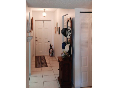 This **beautifully upgraded unit** is located in the on Oriole Golf and Tennis Club in Florida - for sale on GolfHomes.com, golf home, golf lot