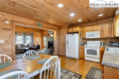 This beautifully maintained and furnished Blue Ridge Log Cabin on Beech Mountain Club in North Carolina - for sale on GolfHomes.com, golf home, golf lot