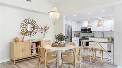 Step into a space that feels like you've left Sarasota behind on The Meadows Golf and Country Club in Florida - for sale on GolfHomes.com, golf home, golf lot