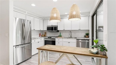 Step into a space that feels like you've left Sarasota behind on The Meadows Golf and Country Club in Florida - for sale on GolfHomes.com, golf home, golf lot