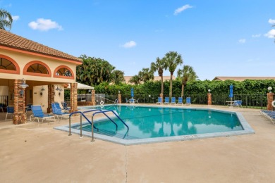 Welcome to this spacious villa in Boynton Beach that offers the on The Links At Boynton Beach - The Family Course in Florida - for sale on GolfHomes.com, golf home, golf lot