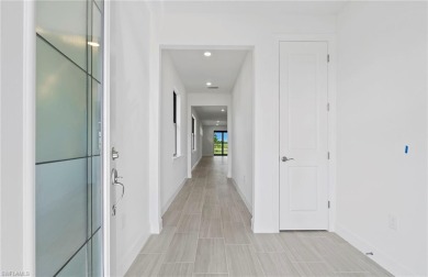 Introducing the Hallmark floor plan, a brand-new 2-bedroom on Panther Run Golf Club in Florida - for sale on GolfHomes.com, golf home, golf lot