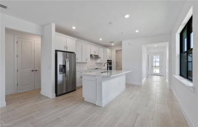 Introducing the Hallmark floor plan, a brand-new 2-bedroom on Panther Run Golf Club in Florida - for sale on GolfHomes.com, golf home, golf lot