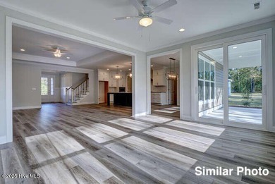 The Otter by American Homesmith offers easy, coastal living in on Lennon Hills Golf Course in North Carolina - for sale on GolfHomes.com, golf home, golf lot