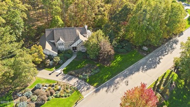 Welcome to this architecturally striking Tudor-inspired on Glenmaura National Golf Club in Pennsylvania - for sale on GolfHomes.com, golf home, golf lot
