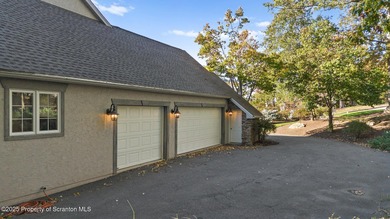 Welcome to this architecturally striking Tudor-inspired on Glenmaura National Golf Club in Pennsylvania - for sale on GolfHomes.com, golf home, golf lot