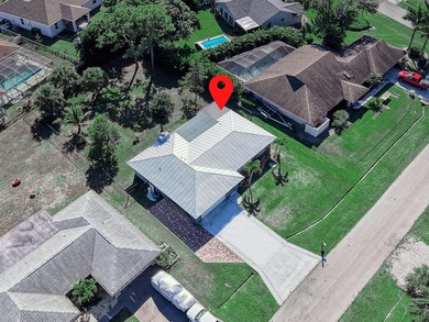 This 1,532 sq ft 3 bed 2 bath 2+ car garage CBS home sits on an on The Saints At Port St Lucie Golf Course in Florida - for sale on GolfHomes.com, golf home, golf lot