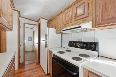 American Condominium - Your Perfect Winter Retreat or Forever on The Links of Lake Bernadette in Florida - for sale on GolfHomes.com, golf home, golf lot