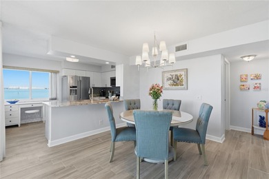 Enjoy sweeping open water views of Boca Ciega Bay from this on Isla Del Sol Yacht and Country Club in Florida - for sale on GolfHomes.com, golf home, golf lot