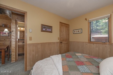 Rustic Cabin Retreat with Lake & Mountain Views in Columbine on Grand Lake Golf Course in Colorado - for sale on GolfHomes.com, golf home, golf lot