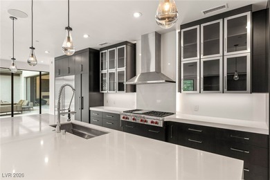 Tucked behind the gates of MacDonald Highlands, this exquisite on Dragon Ridge Country Club in Nevada - for sale on GolfHomes.com, golf home, golf lot