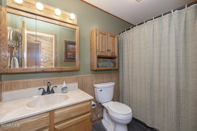 Rustic Cabin Retreat with Lake & Mountain Views in Columbine on Grand Lake Golf Course in Colorado - for sale on GolfHomes.com, golf home, golf lot