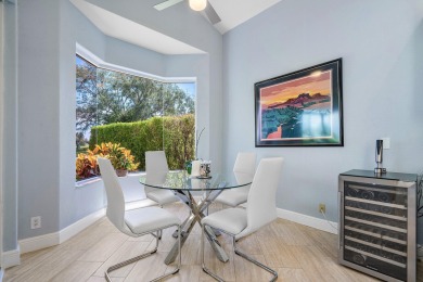 Enjoy stunning golf course & lake views from this 3BR, 21/2BA on Indian Spring Golf and Country Club in Florida - for sale on GolfHomes.com, golf home, golf lot