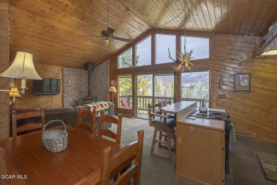 Rustic Cabin Retreat with Lake & Mountain Views in Columbine on Grand Lake Golf Course in Colorado - for sale on GolfHomes.com, golf home, golf lot