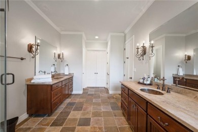 Enviable resort-style living awaits in this luxurious fully on The Traditions Club At Texas A and M in Texas - for sale on GolfHomes.com, golf home, golf lot