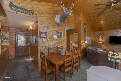 Rustic Cabin Retreat with Lake & Mountain Views in Columbine on Grand Lake Golf Course in Colorado - for sale on GolfHomes.com, golf home, golf lot