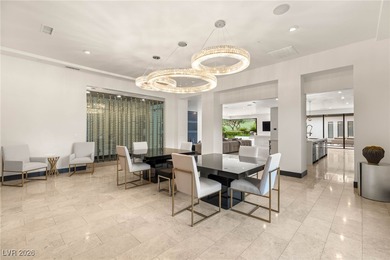 Tucked behind the gates of MacDonald Highlands, this exquisite on Dragon Ridge Country Club in Nevada - for sale on GolfHomes.com, golf home, golf lot