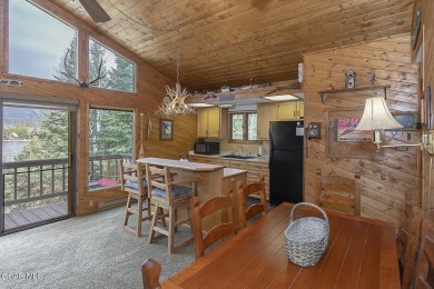 Rustic Cabin Retreat with Lake & Mountain Views in Columbine on Grand Lake Golf Course in Colorado - for sale on GolfHomes.com, golf home, golf lot
