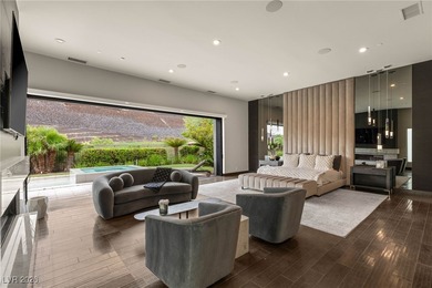 Tucked behind the gates of MacDonald Highlands, this exquisite on Dragon Ridge Country Club in Nevada - for sale on GolfHomes.com, golf home, golf lot