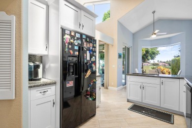 Enjoy stunning golf course & lake views from this 3BR, 21/2BA on Indian Spring Golf and Country Club in Florida - for sale on GolfHomes.com, golf home, golf lot