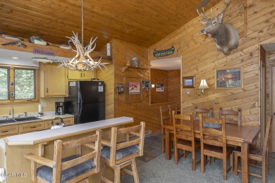 Rustic Cabin Retreat with Lake & Mountain Views in Columbine on Grand Lake Golf Course in Colorado - for sale on GolfHomes.com, golf home, golf lot