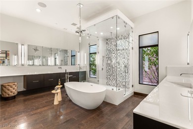 Tucked behind the gates of MacDonald Highlands, this exquisite on Dragon Ridge Country Club in Nevada - for sale on GolfHomes.com, golf home, golf lot