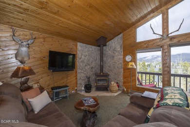 Rustic Cabin Retreat with Lake & Mountain Views in Columbine on Grand Lake Golf Course in Colorado - for sale on GolfHomes.com, golf home, golf lot
