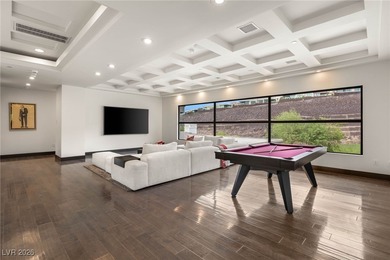 Tucked behind the gates of MacDonald Highlands, this exquisite on Dragon Ridge Country Club in Nevada - for sale on GolfHomes.com, golf home, golf lot