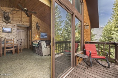 Rustic Cabin Retreat with Lake & Mountain Views in Columbine on Grand Lake Golf Course in Colorado - for sale on GolfHomes.com, golf home, golf lot