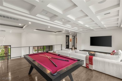 Tucked behind the gates of MacDonald Highlands, this exquisite on Dragon Ridge Country Club in Nevada - for sale on GolfHomes.com, golf home, golf lot