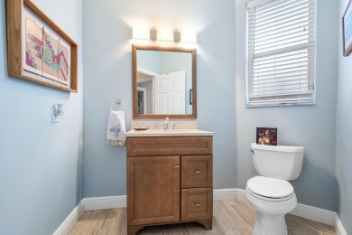 Enjoy stunning golf course & lake views from this 3BR, 21/2BA on Indian Spring Golf and Country Club in Florida - for sale on GolfHomes.com, golf home, golf lot