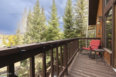Rustic Cabin Retreat with Lake & Mountain Views in Columbine on Grand Lake Golf Course in Colorado - for sale on GolfHomes.com, golf home, golf lot