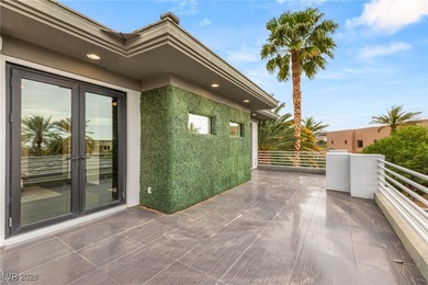Tucked behind the gates of MacDonald Highlands, this exquisite on Dragon Ridge Country Club in Nevada - for sale on GolfHomes.com, golf home, golf lot