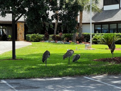 This approx 1200 sf 1990 2 bedroom 2 bath home is located in the on Lake Henry Golf Club in Florida - for sale on GolfHomes.com, golf home, golf lot