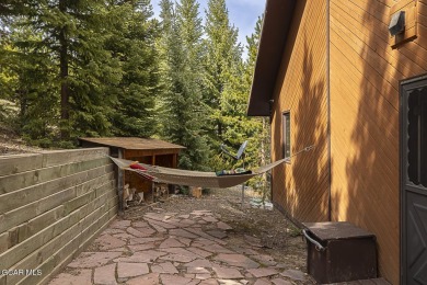 Rustic Cabin Retreat with Lake & Mountain Views in Columbine on Grand Lake Golf Course in Colorado - for sale on GolfHomes.com, golf home, golf lot