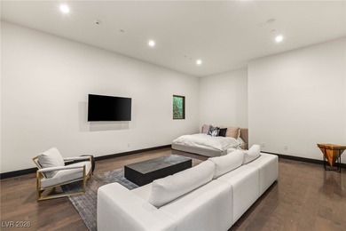 Tucked behind the gates of MacDonald Highlands, this exquisite on Dragon Ridge Country Club in Nevada - for sale on GolfHomes.com, golf home, golf lot