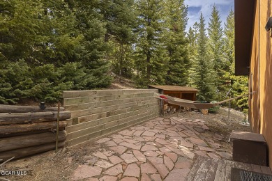 Rustic Cabin Retreat with Lake & Mountain Views in Columbine on Grand Lake Golf Course in Colorado - for sale on GolfHomes.com, golf home, golf lot