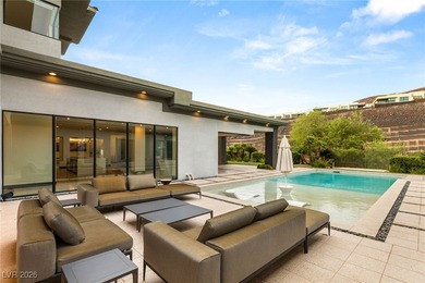 Tucked behind the gates of MacDonald Highlands, this exquisite on Dragon Ridge Country Club in Nevada - for sale on GolfHomes.com, golf home, golf lot