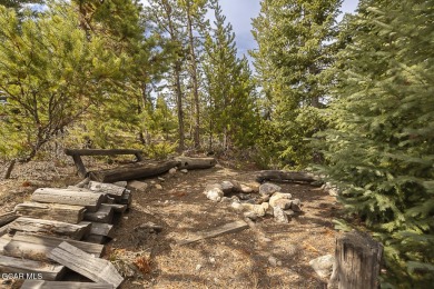 Rustic Cabin Retreat with Lake & Mountain Views in Columbine on Grand Lake Golf Course in Colorado - for sale on GolfHomes.com, golf home, golf lot