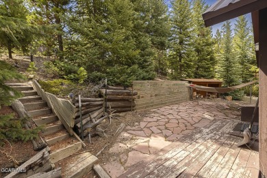 Rustic Cabin Retreat with Lake & Mountain Views in Columbine on Grand Lake Golf Course in Colorado - for sale on GolfHomes.com, golf home, golf lot