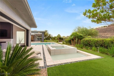 Tucked behind the gates of MacDonald Highlands, this exquisite on Dragon Ridge Country Club in Nevada - for sale on GolfHomes.com, golf home, golf lot