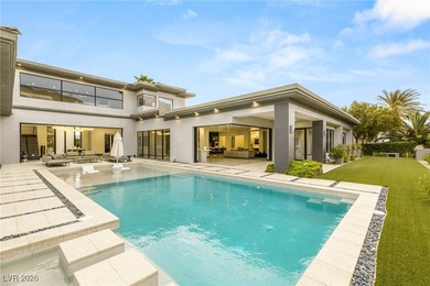 Tucked behind the gates of MacDonald Highlands, this exquisite on Dragon Ridge Country Club in Nevada - for sale on GolfHomes.com, golf home, golf lot