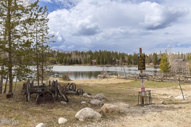 Rustic Cabin Retreat with Lake & Mountain Views in Columbine on Grand Lake Golf Course in Colorado - for sale on GolfHomes.com, golf home, golf lot