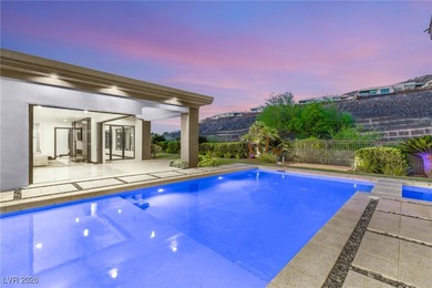 Tucked behind the gates of MacDonald Highlands, this exquisite on Dragon Ridge Country Club in Nevada - for sale on GolfHomes.com, golf home, golf lot