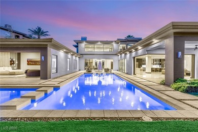 Tucked behind the gates of MacDonald Highlands, this exquisite on Dragon Ridge Country Club in Nevada - for sale on GolfHomes.com, golf home, golf lot