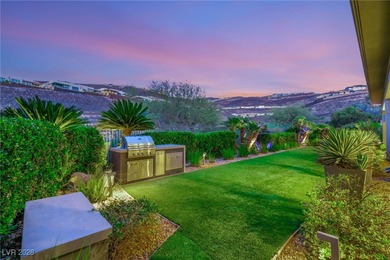 Tucked behind the gates of MacDonald Highlands, this exquisite on Dragon Ridge Country Club in Nevada - for sale on GolfHomes.com, golf home, golf lot