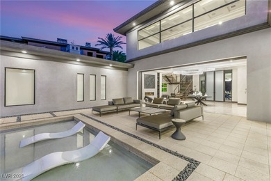 Tucked behind the gates of MacDonald Highlands, this exquisite on Dragon Ridge Country Club in Nevada - for sale on GolfHomes.com, golf home, golf lot