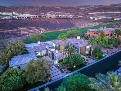 Tucked behind the gates of MacDonald Highlands, this exquisite on Dragon Ridge Country Club in Nevada - for sale on GolfHomes.com, golf home, golf lot